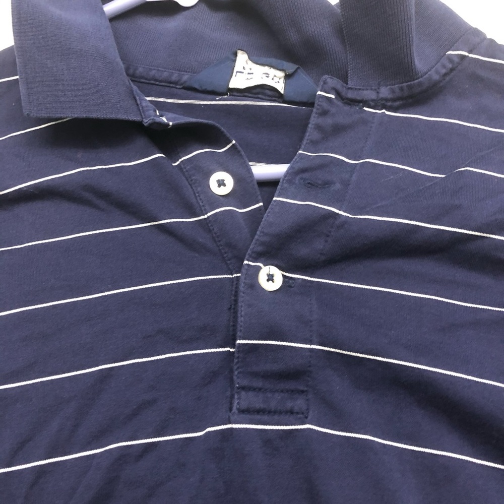 Navy Blue Polo Golf with white stripes